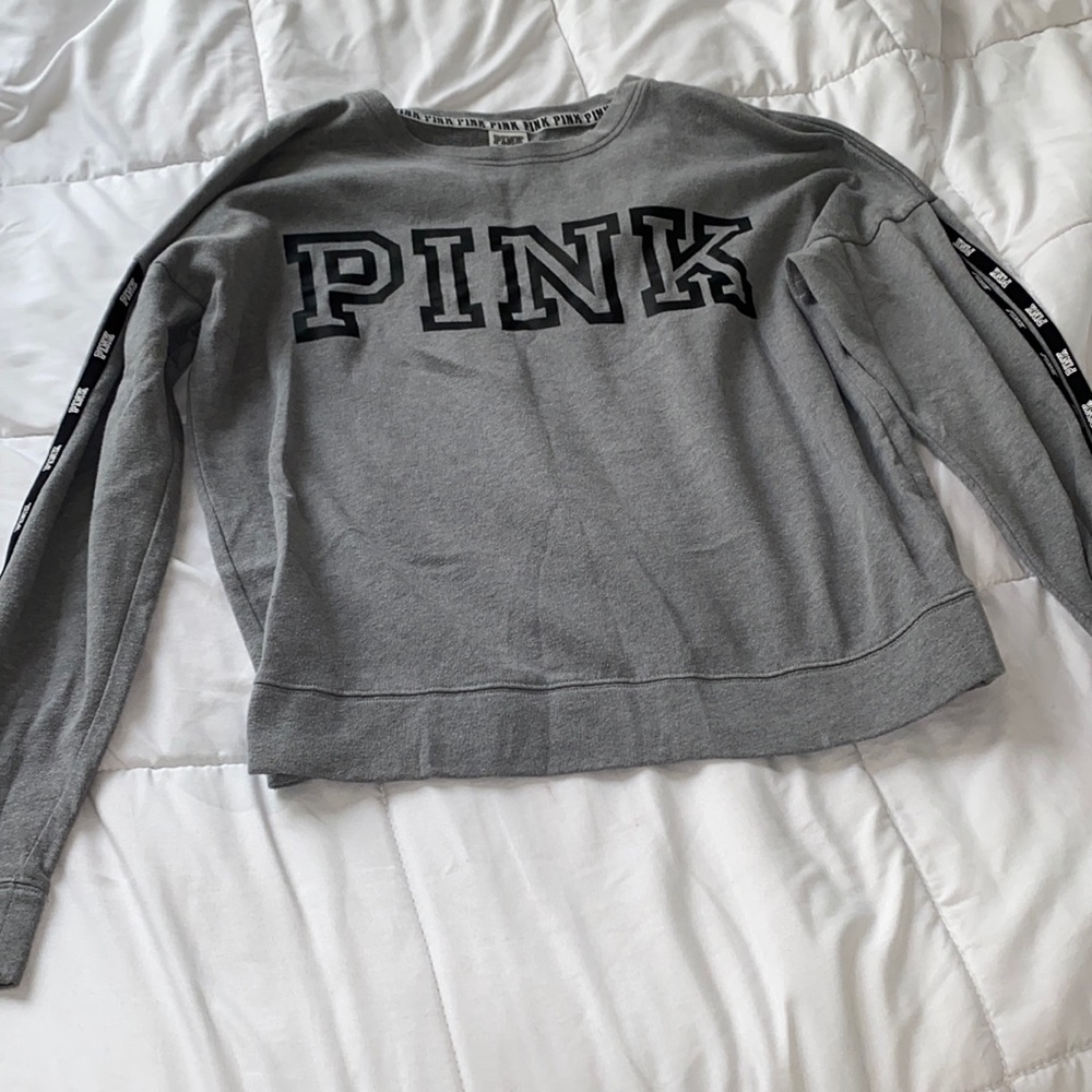 light gray sweater.